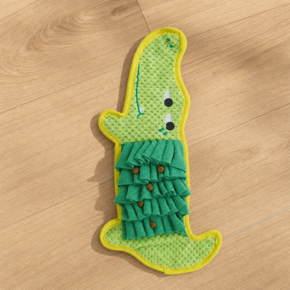 Crocodile Crinkle Snuffle Mat with treats tucked in the fleece